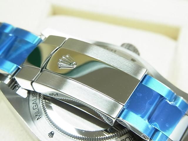 ロレックス ミルガウス ブラックダイヤル グリーンサファイア
