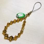 スワロフスキー ハンドメイド限定品☆メダイ付きストラップ(黄)