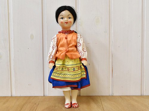 緑園｜東欧雑貨 旧ソ連 オレンジ色のベストを着た民族衣装の女の子人形