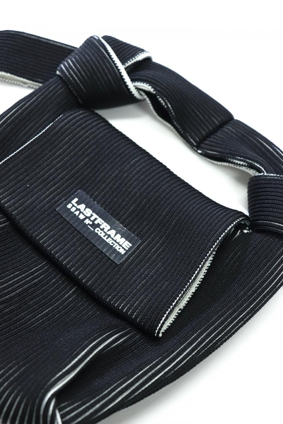 LASTFRAME(ラストフレーム)のTWO TONE OBI BAG BLACK x IVORYの