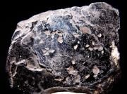 Ŵ (ʥ/Ilmenite)