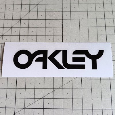 OAKLEY オークリー カッティングステッカー 油っこく W150mm H50mm