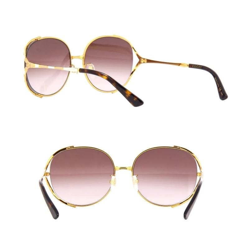 å GUCCI GG0595S 004