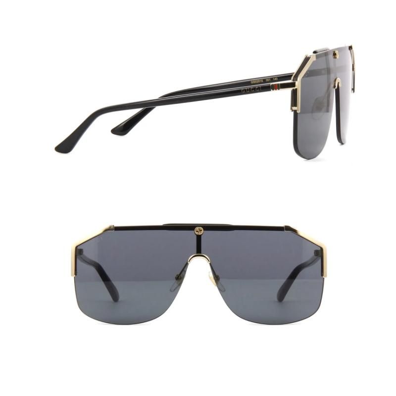 å GUCCI GG0291S 001