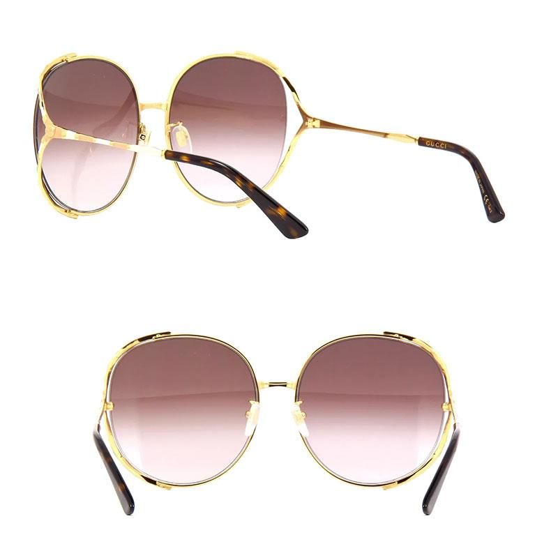 å GUCCI GG0595S 008