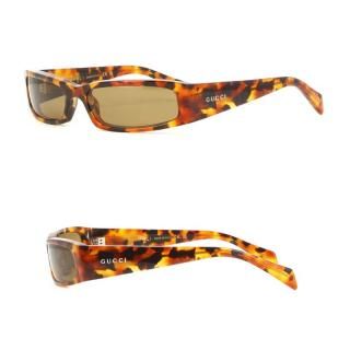 å GUCCI GG1778S 008