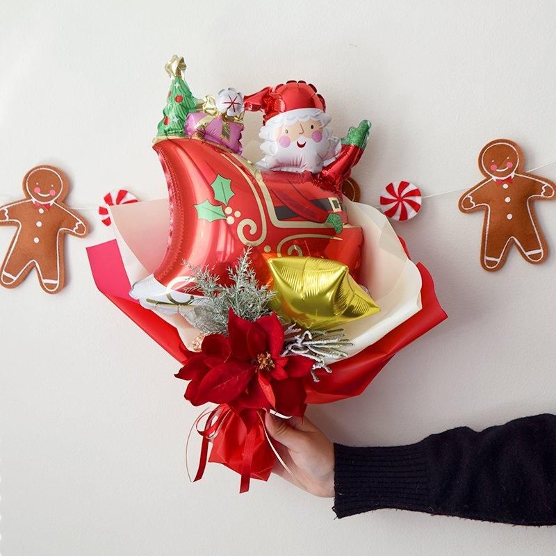 サンタクロースとポインセチアのクリスマスブーケ 【膨らませてお届け