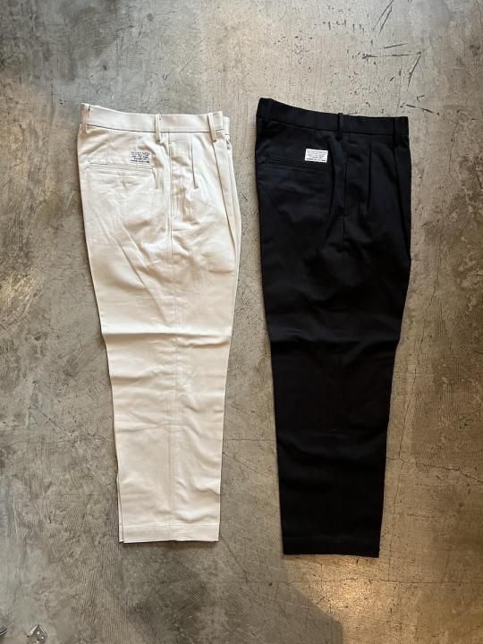 DOUBLE PLEATED CHINO TROUSERS