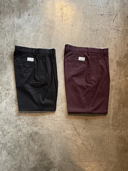 DOUBLE PLEATED CHINO TROUSERS