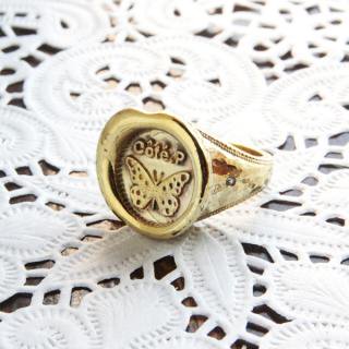THE LETTERSFASHION RING hummer brass Butterfly